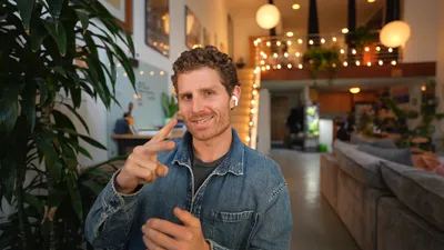 Matt Palmer in a talking-head video frame with agent interface on screen